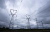 Canada's ambition to eliminate greenhouse gas emissions by 2050 and stay competitive in the low-carbon industrial revolution underway is a complicated plan that hinges on one main thing: electricity. Power lines are seen against cloudy skies near Kingston, Ont. , Wednesday, Sept. 7, 2022 in Ottawa. THE CANADIAN PRESS/Adrian Wyld