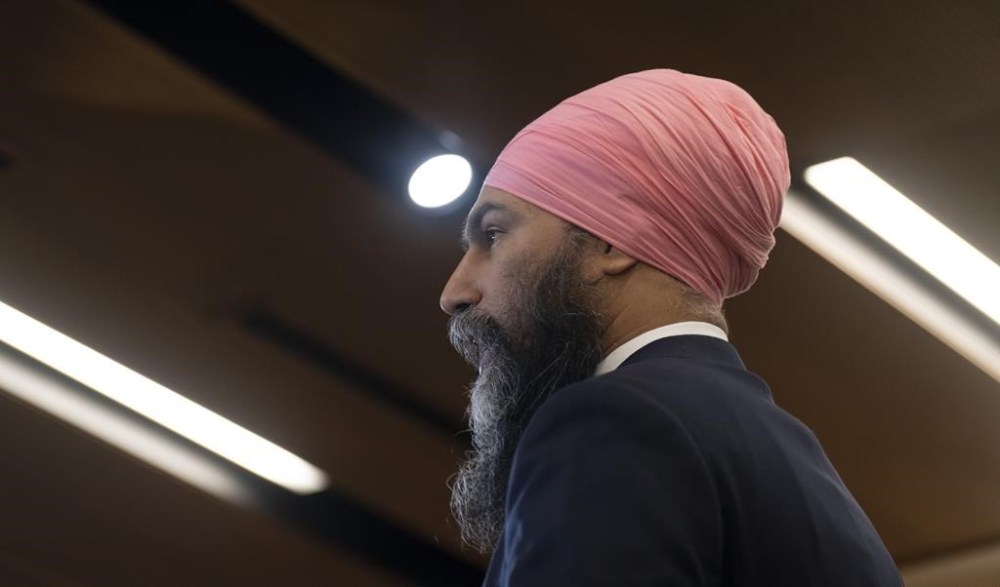 New Democratic Party leader Jagmeet Singh speaks before caucus, in Ottawa, Wednesday, March 29, 2023. One of the last outstanding items within the NDP-Liberal deal for this year is getting a pharmacare bill tabled in the House of Commons. THE CANADIAN PRESS/Adrian Wyld