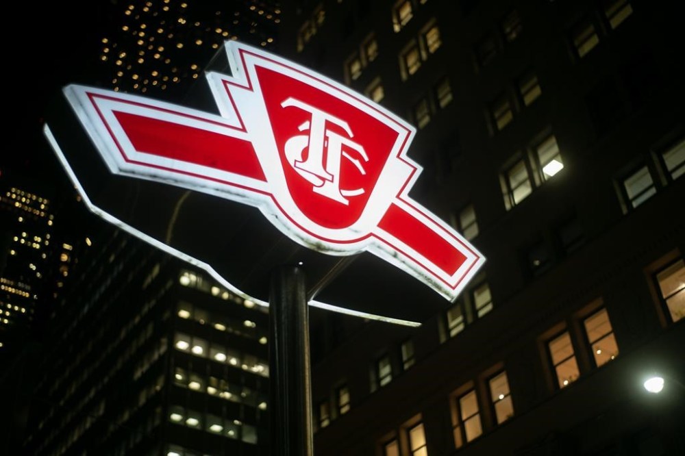 A Toronto Transit Commission sign is shown at a downtown Toronto subway stop Tuesday, Jan. 24, 2023. Advocates are urging government officials to heed a grieving mother's plea for more funding and support for mental health, housing and social services after her teenage son was stabbed to death in a Toronto subway station. THE CANADIAN PRESS/Graeme Roy