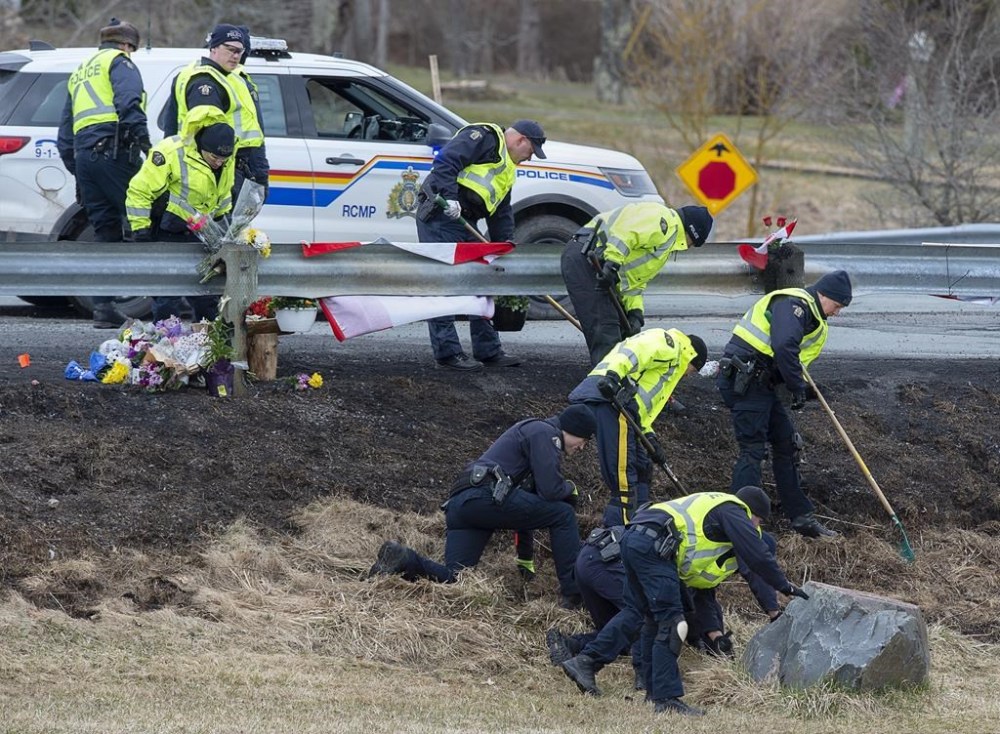 RCMP investigators search for evidence at the location where Const. Heidi Stevenson was killed along the highway in Shubenacadie, N.S. on Thursday, April 23, 2020.THE CANADIAN PRESS/Andrew Vaughan