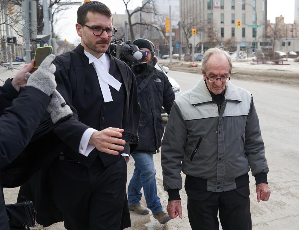 Retired priest Arthur Masse, 93, leaves the Law Courts in Winnipeg, Thursday, March 30, 2023, after a judge acquitted him of indecent assaut. THE CANADIAN PRESS/David Lipnowski