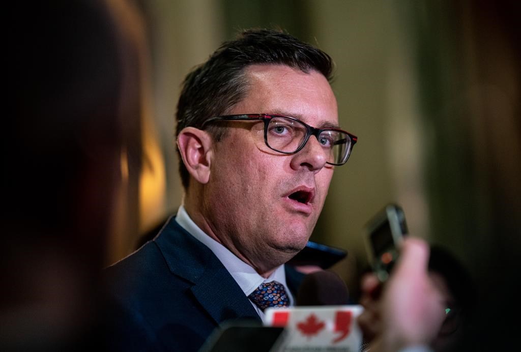 Saskatchewan Minister of Health Paul Merriman speaks to the media after the budget is presented in Regina, on Wednesday, March 22, 2023. THE CANADIAN PRESS/Heywood Yu