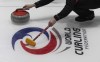 Canada vice-skip Mark Nichols releases a rock during a practice session at the World Curling Championship, Friday, March 31, 2023 in Ottawa. THE CANADIAN PRESS/Adrian Wyld