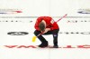 Canadian skip Brad Gushue reacts after delivering a stone while taking on Switzerland at the Men's World Curling Championship in Ottawa on Saturday, April 1, 2023. THE CANADIAN PRESS/Sean Kilpatrick