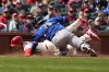 St. Louis Cardinals' Nolan Gorman, rear, is tagged out at home by Toronto Blue Jays catcher Danny Jansen (9) during the sixth inning of a baseball game, Saturday, April 1, 2023, in St. Louis. (AP Photo/Jeff Roberson)