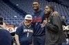 New Orleans Pelicans forward Zion Williamson, center, takes a photo with Mason Pepin, 19, left, who is a pediatric cancer patient at St. Jude's Hospital, and Pepin's friend Sean Ario before the team's NBA basketball game against the Los Angeles Clippers in New Orleans, Saturday, April 1, 2023. Williamson came out of the locker room before the game to sign autographs for and take pictures with the family. (AP Photo/Matthew Hinton)