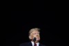 FILE - Former President Donald Trump speaks at a campaign rally in support of the campaign of Ohio Senate candidate JD Vance at Wright Bros. Aero Inc. at Dayton International Airport on Nov. 7, 2022, in Vandalia. Trump, the first former president to be indicted, is scheduled to be arraigned in New York next week. He is not the first president, in or out of office, in legal trouble. (AP Photo/Michael Conroy, File)