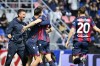 Bologna's Stefan Posch, second right, celebrates with teammate Thiago Motta after scoring to 1-0 during the Serie A soccer match between Bologna FC and Udinese Calcio at the Renato Dall'Ara stadium in Bologna, Italy, Sunday April 2, 2023. (Massimo Paolone/LaPresse via AP)