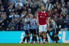 Manchester United's Luke Shaw reacts after Newcastle's Callum Wilson scoring his side's second goal during the English Premier League soccer match between Newcastle United and Manchester United, at St. James' Park stadium in Newcastle, England, Sunday, April 2, 2023. (AP Photo/Jon Super)