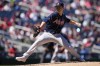 Atlanta Braves starting pitcher Jared Shuster throws during the third inning of a baseball game against the Washington Nationals at Nationals Park, Sunday, April 2, 2023, in Washington. (AP Photo/Alex Brandon)
