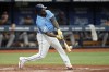 Tampa Bay Rays' Randy Arozarena connects for a solo home run off Detroit Tigers starting pitcher Joey Wentz during the fourth inning of a baseball game Sunday, April 2, 2023, in St. Petersburg, Fla. (AP Photo/Chris O'Meara)