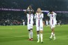Lyon's Bradley Barcola, right, Dejan Lovren, centre, and Castello Lukeba celebrate after the French League One soccer match between Paris Saint-Germain and Lyon at the Parc des Princes stadium in Paris, Sunday, April 2, 2023. (AP Photo/Aurelien Morissard)