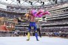 In this photo provided by WWE, social media star Logan Paul faces Seth Rollins during WrestleMania 39 on Saturday, April 1, 2023, at SoFi Stadium in Inglewood, Calif. This was the second straight year Paul was in a match in WWE's signature event. (WWE via AP)
