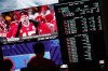 A person gambles as betting odds for NFL football's Super Bowl are displayed on monitors at the Circa resort and casino sports book in Las Vegas, Friday, Feb. 3, 2023. The first year of legal single-game sports betting in Ontario has been a whirlwind for NorthStar Gaming CEO Michael Moskowitz. THE CANADIAN PRESS/AP-John Locher