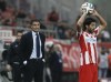 FILE - Olympiakos coach Míchel reacts during a Greek super league soccer match between Olympiakos and PAOK at Georgios Karaiskakis Stadium in the port of Piraeus near Athens, Wednesday, Dec. 3, 2014. Spanish coach Jose Miguel Gonzalez resigned from the helm at Greek club Olympiakos late Monday, April 3, 2023, following a disappointing result in the annual league playoffs. (AP Photo/Petros Giannakouris, File)