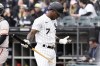 Chicago White Sox's Tim Anderson looks at his hand after striking out swinging during the first inning of the White Sox season home opening baseball game against the San Francisco Giants in Chicago, Monday, April 3, 2023. (AP Photo/Nam Y. Huh)