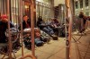 A line for court access is formed outside Manhattan Criminal Court, Tuesday, April 4, 2023, in New York. Former President Donald Trump is facing multiple charges of falsifying business records, including at least one felony offense, in the indictment handed up by a Manhattan grand jury. (AP Photo/John Minchillo)