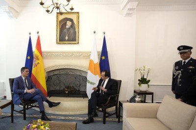 Cyprus' President Nikos Christodoulides and Spanish Prime Minister Pedro Sanchez, left, talk during their meeting at the presidential palace in capital Nicosia, Cyprus, Tuesday, April 4, 2023. (AP Photo/Petros Karadjias, Pool)