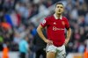 Manchester United's Diogo Dalot reacts at the end of the English Premier League soccer match between Newcastle United and Manchester United, at St. James' Park stadium in Newcastle, England, Sunday, April 2, 2023. (AP Photo/Jon Super)