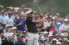 Scottie Scheffler follows his ball off the 12th tee during a practice for the Masters golf tournament at Augusta National Golf Club, Tuesday, April 4, 2023, in Augusta, Ga. (AP Photo/Mark Baker)