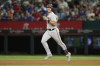 Baltimore Orioles' Ryan Mountcastle rounds the bases after hitting a three-run home run in the second inning of a baseball game against the Texas Rangers, Tuesday, April 4, 2023, in Arlington, Texas. (AP Photo/Tony Gutierrez)
