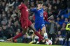 Chelsea's Kai Havertz, right, duels for the ball with Liverpool's Ibrahima Konate during the English Premier League soccer match between Chelsea and Liverpool at Stamford Bridge stadium in London, Tuesday, April 4, 2023. (AP Photo/Frank Augstein)