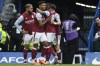 Aston Villa's Ollie Watkins, center, celebrates after scoring during the English Premier League soccer match between Chelsea and Aston Villa at Stamford Bridge stadium in London, Saturday, April 1, 2023. (AP Photo/David Cliff)