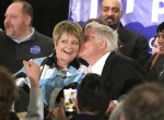 Supreme Court candidate Janet Protasiewicz gets a kiss from her husband Greg Sell while speaking at her election night watch party in Milwaukee, Wis., on Tuesday, April 4, 2023. Protasiewicz, 60, defeated former Justice Dan Kelly, who previously worked for Republicans and had support from the state’s leading anti-abortion groups. (Mike De Sisti /Milwaukee Journal-Sentinel via AP)