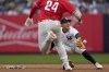 New York Yankees shortstop Anthony Volpe (11) makes a catch before tagging out Philadelphia Phillies' Darick Hall (24) as he runs to second on a fly ball to right field in the third inning of a baseball game, Wednesday, April 5, 2023, in New York. (AP Photo/John Minchillo)