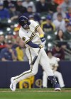 Milwaukee Brewers first baseman Owen Miller hits a run-scoring single against the New York Mets during the second inning of a baseball game Wednesday, April 5, 2023, in Milwaukee. (AP Photo/Jeffrey Phelps)