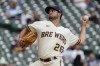 FILE - Milwaukee Brewers relief pitcher Aaron Ashby throws during the fourth inning of a baseball game on Oct. 5, 2022, in Milwaukee. Ashby will undergo arthroscopic surgery on his throwing shoulder and will miss most of the season, if not all of it, Brewers manager Craig Counsell said Wednesday, April 5, 2023. (AP Photo/Morry Gash, File)