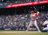 Los Angeles Angels' Shohei Ohtani bats during the first inning of a baseball game against the Seattle Mariners, Wednesday, April 5, 2023, in Seattle. (AP Photo/Lindsey Wasson)
