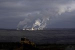 FILE - Steam rises from a power plant located by the Turow lignite coal mine near the town of Bogatynia, Poland, Jan. 15, 2022. The burning of coal for electricity, cement, steel and other uses went up in 2022 despite global promises to phase down the fuel that's the biggest source of planet-warming gases in the atmosphere, a report late Wednesday, April 5, 2023, found. (AP Photo/Petr David Josek, File)