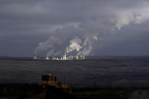 FILE - Steam rises from a power plant located by the Turow lignite coal mine near the town of Bogatynia, Poland, Jan. 15, 2022. The burning of coal for electricity, cement, steel and other uses went up in 2022 despite global promises to phase down the fuel that's the biggest source of planet-warming gases in the atmosphere, a report late Wednesday, April 5, 2023, found. (AP Photo/Petr David Josek, File)