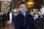 Li Zhai of the Noodle Topia restaurant is interviewed, Monday, March 20, 2023 in Madison Heights, Mich. Zhai was having trouble finding staff for the restaurant in the summer of 2021, so he bought a robot which was so successful he added two more. With the robots, Zhai only needs three workers to do the same volume of business that five or six people used to handle. (AP Photo/Carlos Osorio)