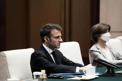 France's President Emmanuel Macron, left, attends a meeting with the head of China's National People’s Congress Zhao Leji at the Great Hall of the People in Beijing, China, Thursday, April 6, 2023. (AP Photo/Thibault Camus, Pool)