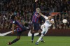 Real Madrid's Karim Benzema, right, attempts a shot at goal and misses past Barcelona's Jules Kounde, left, during the Spanish Copa del Rey semifinal, second leg soccer match between Barcelona and Real Madrid at the Camp Nou stadium in Barcelona, Spain, Wednesday, April 5, 2023. (AP Photo/Joan Monfort)
