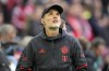 Bayern's head coach Thomas Tuchel stands on the pitch before the German Bundesliga soccer match between FC Bayern Munich and Borussia Dortmund at the Allianz Arena stadium in Munich, Germany, Saturday April 1, 2023. (AP Photo/Matthias Schrader)