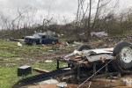FILE - The remains of a mobile home that was torn apart by a tornado cover the ground in Glen Allen, Mo., on Wednesday, April 5, 2023. Five people who were either in the mobile home or in a camper parked next to it died in the tornado, the Missouri State Highway Patrol said Thursday, April 6. (AP Photo/Jim Salter, File)