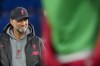 Liverpool's manager Jurgen Klopp looks on during warm up before the English Premier League soccer match between Chelsea and Liverpool at Stamford Bridge stadium in London, Tuesday, April 4, 2023. (AP Photo/Frank Augstein)
