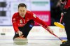 Canadian skip Brad Gushue delivers as they play Turkey at the Men's World Curling Championship in Ottawa on Friday, April 7, 2023. THE CANADIAN PRESS/Sean Kilpatrick
