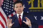 FILE - Florida Gov. Ron DeSantis speaks to a crowd at Adventure Outdoors gun store, Thursday, March 30, 2023, in Smyrna, Ga. DeSantis won a commanding 20-point reelection last year, even carrying the longtime Democratic stronghold of Miami-Dade County. (AP Photo/John Bazemore, File)
