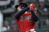 Atlanta Braves' Austin Riley watches his RBI single against the San Diego Padres during the third inning of a baseball game Friday, April 7, 2023, in Atlanta. (AP Photo/John Bazemore)