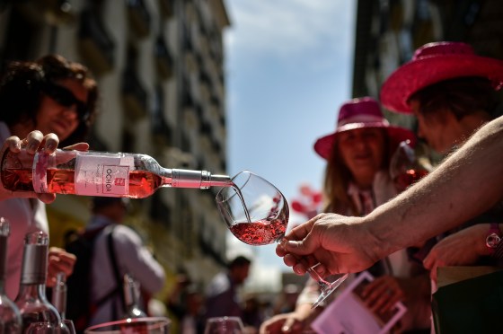 Pink wine? Being poured outdoors? Yes please. (Alvaro Barrientos / The Associated Press files)