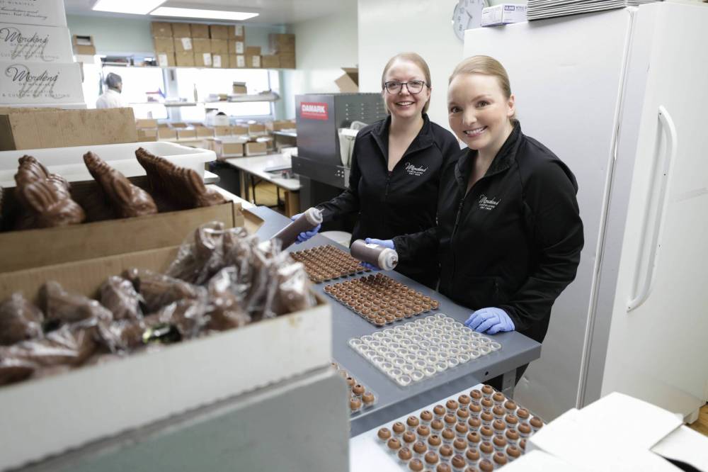 RUTH BONNEVILLE / WINNIPEG FREE PRESS
Mariel Morden-Miller (right) and her sister Hilary Morden grew up in the business, working with chocolate as teens and formally joining the team after graduating from university.