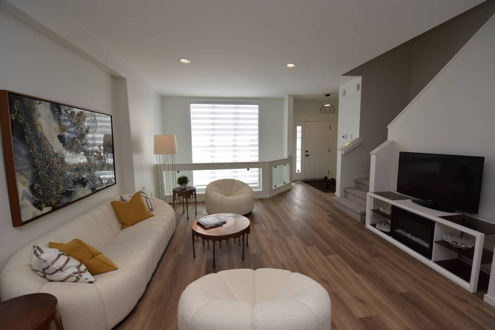 Style and function merge seamlessly in the bright, spacious family room.