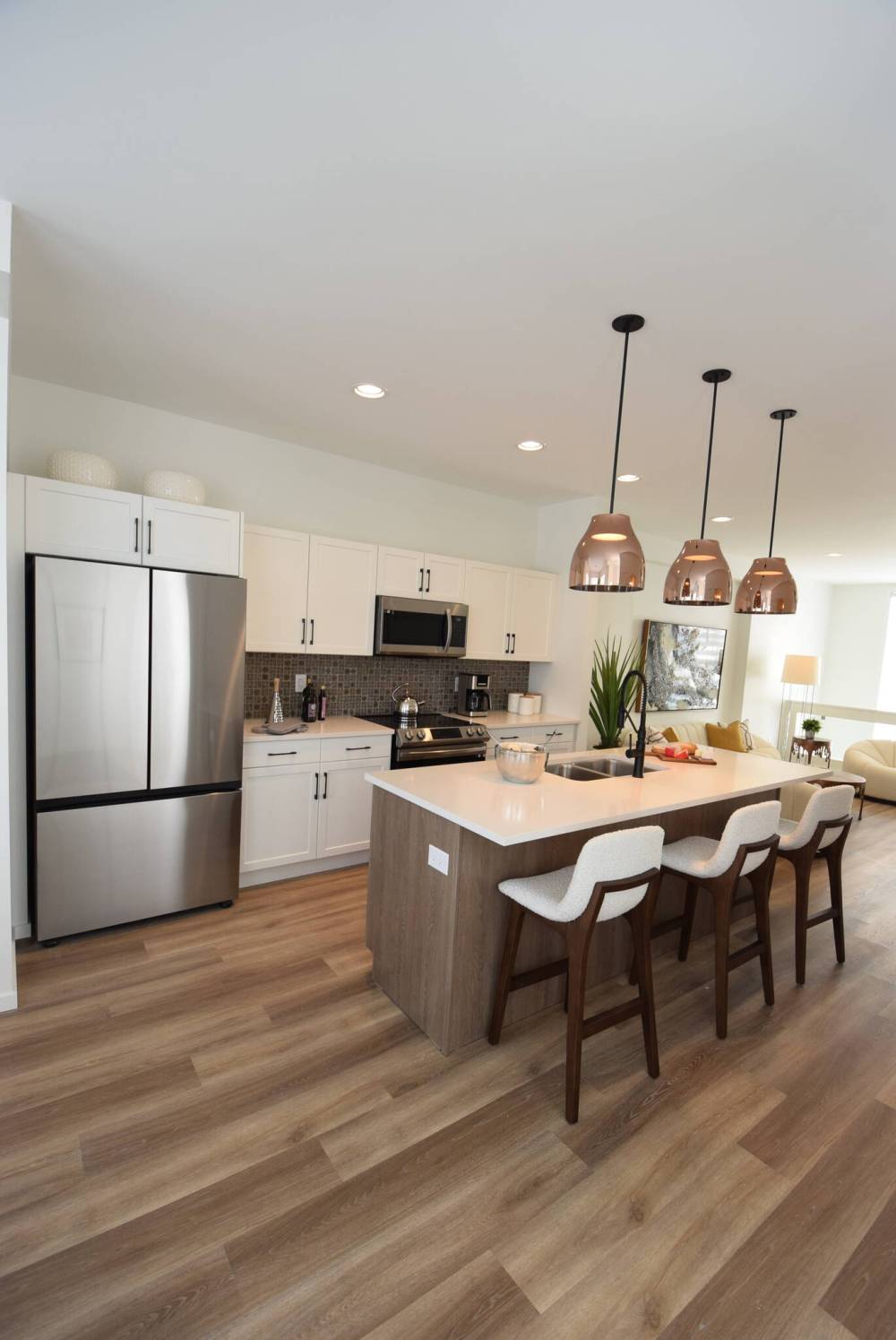 There’s plenty of room to create in the centrally-located island kitchen in this well-appointed two-storey home.