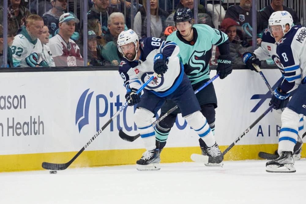John Froschauer / The Associated Press files
Jets forward Sam Gagner makes a play earlier in the season in a game against the Seattle Kraken.