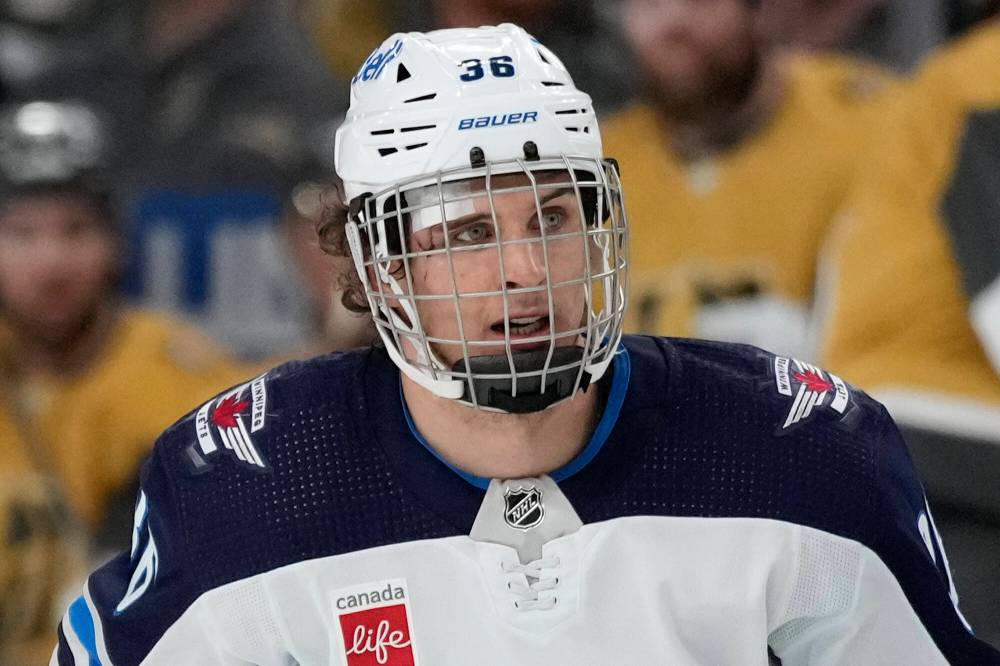 Winnipeg Jets’ Morgan Barron plays with a bandage after receiving stitches to repair a cut he got during the first period against the Vegas Golden Knights in Game 1 of their Stanley Cup first-round playoff series Tuesday in Las Vegas. (AP Photo/John Locher)
