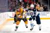 (AP Photo/Lucas Peltier)
                                Golden Knights centre Jonathan Marchessault shoots the puck past Winnipeg Jets right wing Blake Wheeler during the second period.